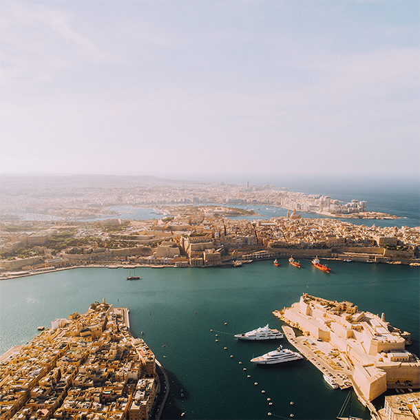 Aerial view of Malta three cities and surrounding bodies of water.